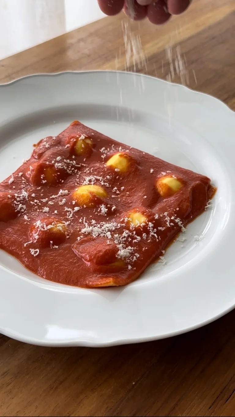 Ricotta ravioli with burro e oro sauce