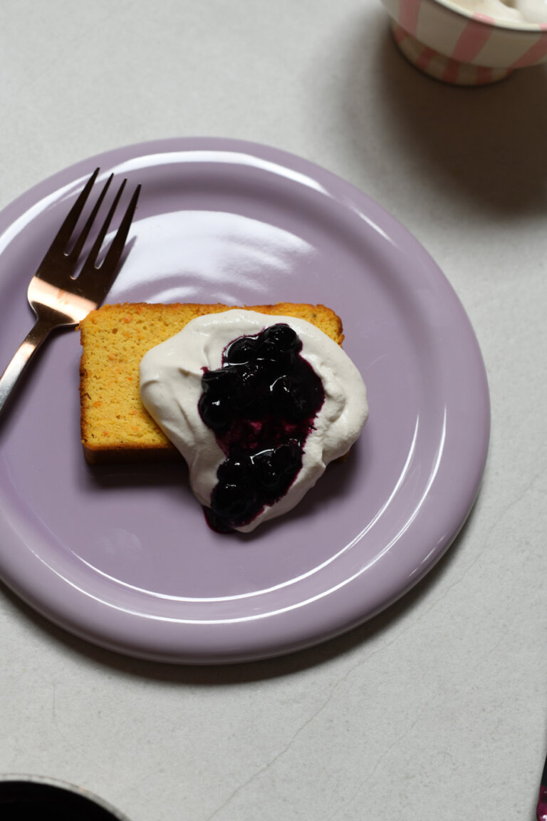 Whole citrus cake with whipped blueberries and cream yoghurt