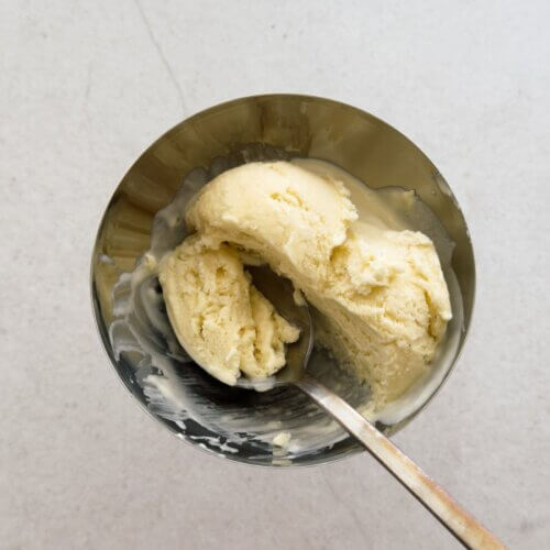 No churn salted vanilla tahini ice cream, served in a metal coupe.